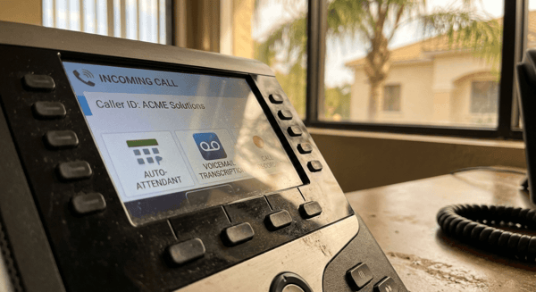 VoIP desk phone display showing incoming call with caller ID information